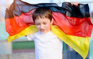 Boy holding the German flag
